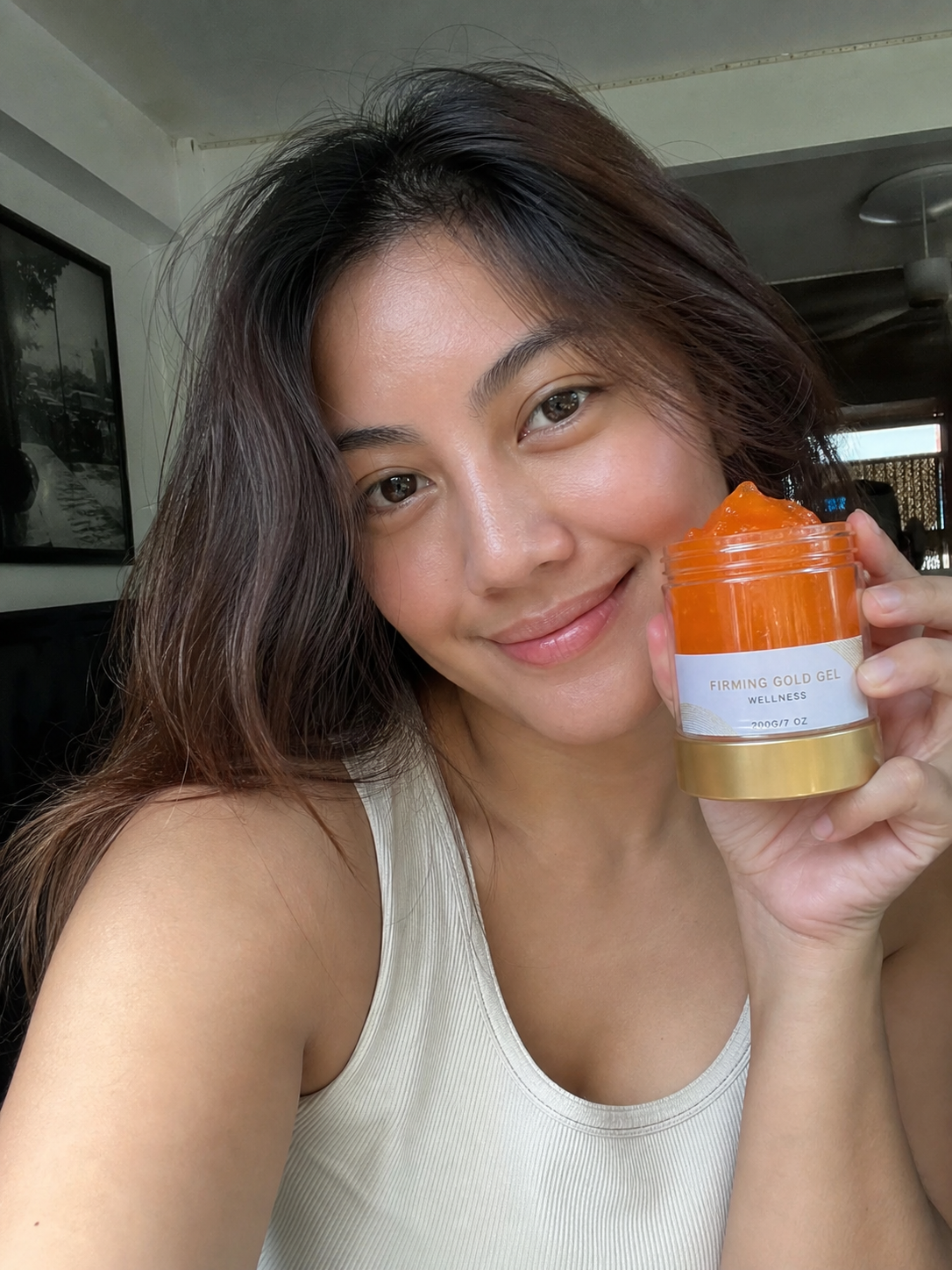Beauty Kiwi customer using Cryo Thermo Firming Gold Gel in an everyday body-care routine